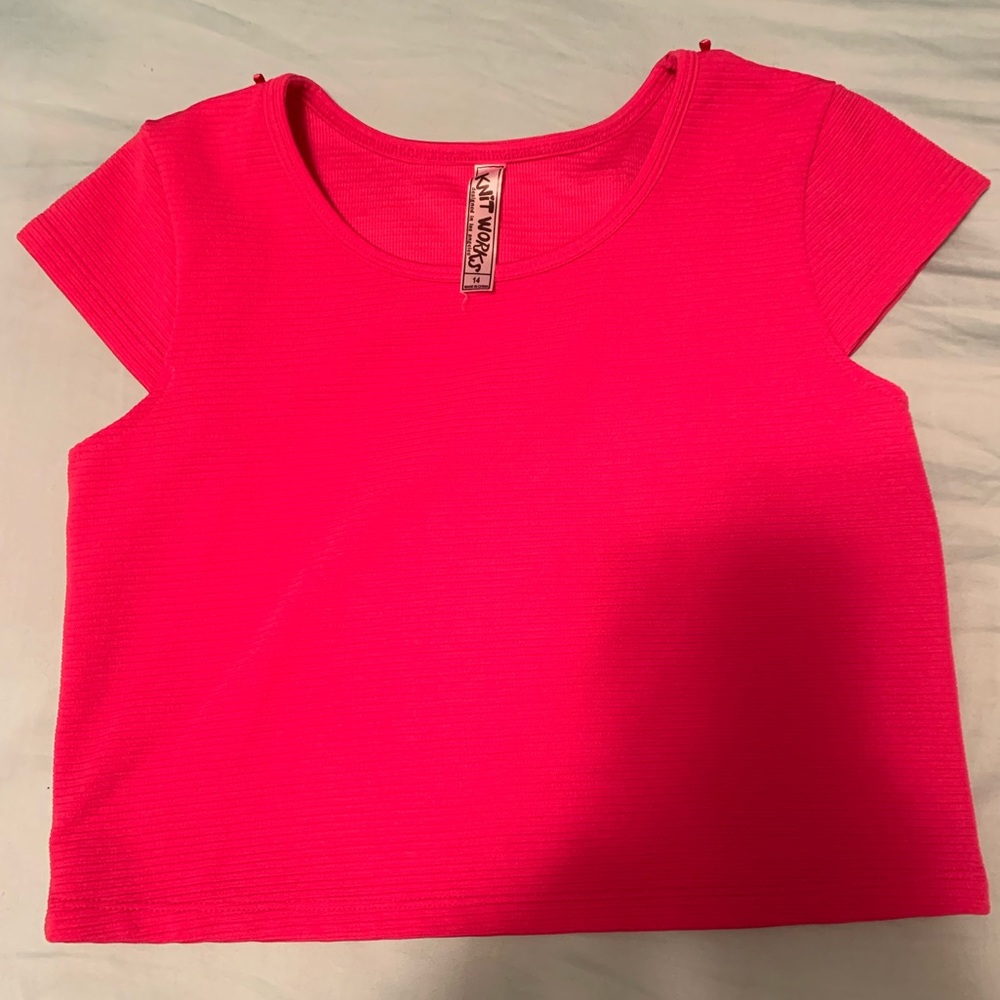 Bright pink cropped shirt